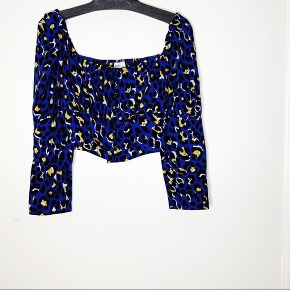 RAHI crop top. Blue with black and yellow print. - Picture 2 of 6